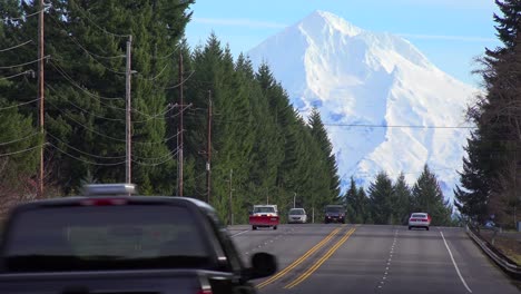 Cars-and-trucks-travel-on-a-highway-below-Mt-Hood-Oregon