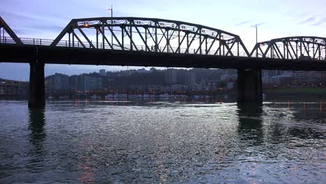 A-panning-shot-across-a-bridge-over-the-Willamette-River-in-Portland-Oregon