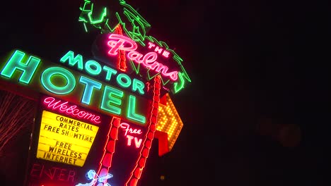 A-1950's-neon-sign-welcomes-travelers-to-a-classic-old-roadside-motel-1