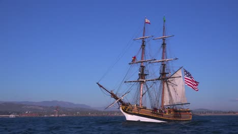 A-tall-masted-clipper-ship-sails-on-the-high-seas