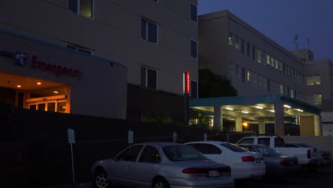 Establishing-shot-of-a-hospital-emergency-room-at-night-1