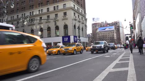 Cars-pass-on-a-Manhattan-street-in-New-York-City