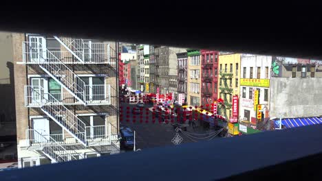 Establishing-high-angle-shot-of-the-Chinatown-district-with-lamps-and-lanterns-in-New-York-City-1