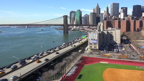 The-Brooklyn-Bridge-East-River-and-FDR-parkway-on-a-clear-sunny-day-in-New-York-City-3