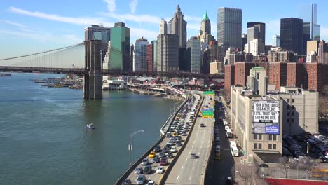 The-Brooklyn-Bridge-East-River-and-FDR-parkway-on-a-clear-sunny-day-in-New-York-City-6