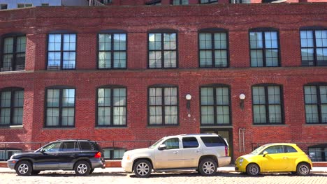 Establishing-shot-of-a-brownstone-brick-office-building-in-Brooklyn's-dumbo-neighborhood