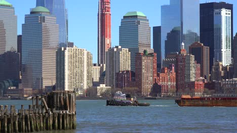 A-tugboat-pulls-a-barge-on-the-Hudson-River-in-New-York-City