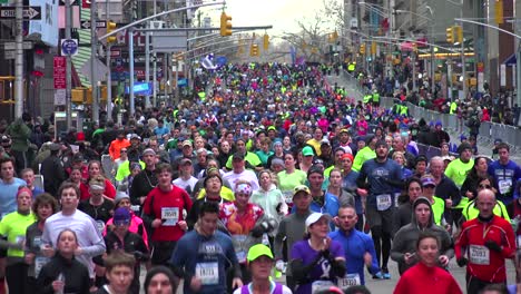 A-very-good-shot-of-the-New-York-City-Marathon-and-runners-moving-down-Manhattan-streets