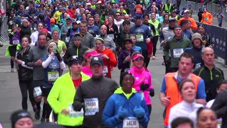 A-very-good-shot-of-the-New-York-City-Marathon-and-runners-moving-down-Manhattan-streets-2