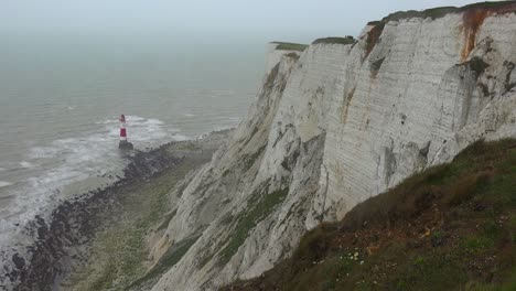 A-lighthouse-along-the-White-Cliffs-of-Dover-near-Beachy-Head-in-Southern-England-1