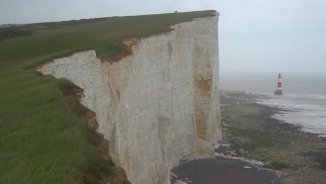 A-lighthouse-along-the-White-Cliffs-of-Dover-near-Beachy-Head-in-Southern-England-2