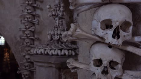 Skulls-and-bones-hang-from-the-walls-at-the-Sedlec-Ossuary-in-the-Czech-Republic-2