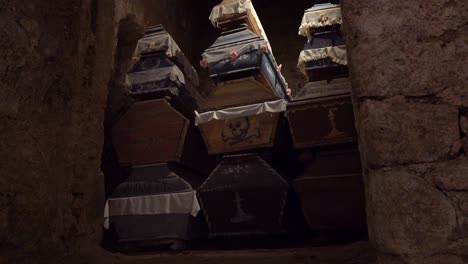 Coffins-are-piled-inside-a-tomb-in-Vac-Hungary