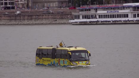 An-amphibious-tour-bus-travels-down-the-Danube-River-in-Budapest-Hungary