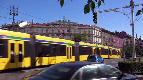 A-busy-city-street-with-traffic-in-downtown-Budapest-Hungary-1