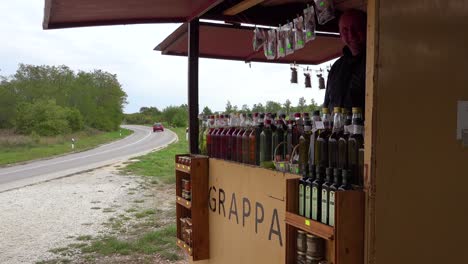 An-outdoor-stand-sells-grappa-an-alcoholic-drink-along-the-roadside-in-Croatia--2