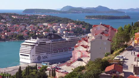 A-giant-cruise-ship-is-docked-in-the-bay-in-the-old-city-of-Dubrovnik-Croatia