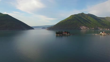 Beautiful-aerial-over-the-Our-Lady-rock-island-church-in-Boka-Bay-Montenegro-1