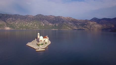 Beautiful-aerial-over-the-Our-Lady-rock-island-church-in-Boka-Bay-Montenegro-5