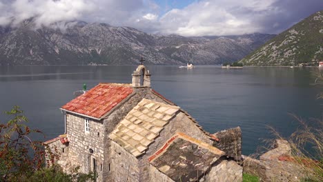 A-beautiful-old-stone-building-on-the-shores-of-Boka-Bay-Montenegro