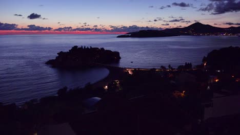 Remarkable-high-angle-night-shot-over-the-beautiful-Sveti-Stefan-island-in-Montenegro