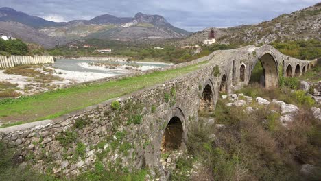 An-old-stone-bridge-crosses-a-river-in-Albania