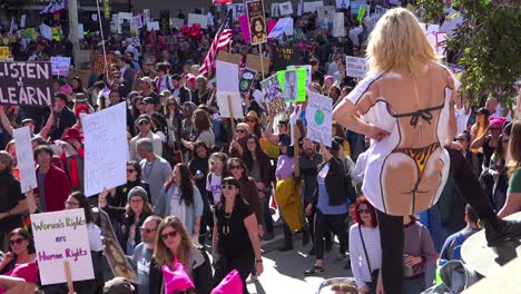 Hundreds-of-thousands-marching-and-carrying-signs-to-protest-the-presidency-of-Donald-Trump-in-downtown-Los-Angeles-California-2