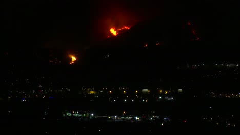 Out-of-control-wildfire-burns-behind-a-California-city-at-night-2