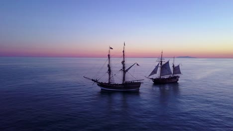 Spectacular-aerial-of-two-tall-sailing-ships-on-the-open-ocean-1