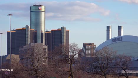 Establishing-shot-of-Detroit-Michigan-with-GM-tower-and-Ford-Field