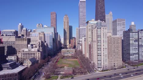 Rising-aerial-along-lakeshore-Drive-reveals-downtown-Chicago-skyline