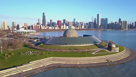An-aerial-of-the-Adler-Planetarium-with-the-Chicago-skyline-in-the-background-1
