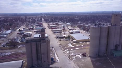 An-aerial-along-grain-silos-reveals-a-small-American-Midwest-farming-town