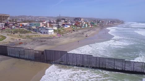 Aerial-of-the-US-Mexico-border-fence-in-the-Pacific-Ocean-between-San-Diego-and-Tijuana-1