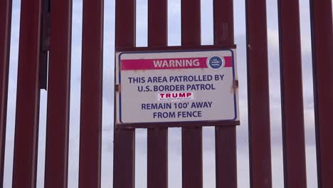 A-sign-along-the-US-mexico-border-indicates-that-it-is-patrolled-by-Donald-Trump