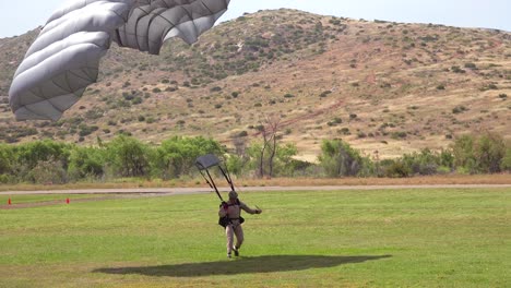 Elite-military-forces-and-paratroopers-skydive-onto-and-land-in-a-field-during-training-operations-5