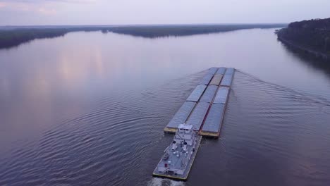 A-beautiful-aerial-of-a-barge-traveling-on-the-Mississippi-River-2