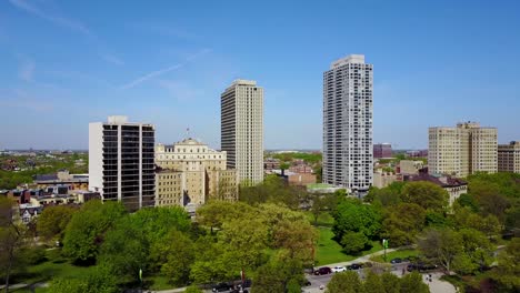 Beautiful-aerial-shot-of-parks-and-high-rise-apartments-along-Lakeshore-Avenue-in-downtown-Chicago
