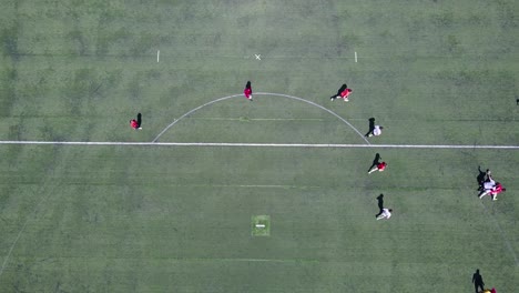 Aerial-shot-over-an-amateur-soccer-match-on-a-soccer-field-1