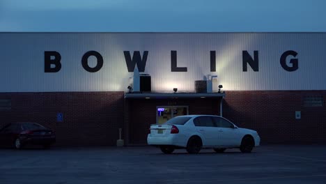 Establishing-shot-of-a-bowling-alley-at-night