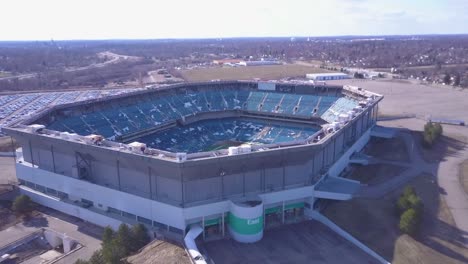 Aerial-over-the-abandoned-and-incredibly-spooky-Pontiac-Silverdome-football-stadium-near-Detroit-Michigan-2