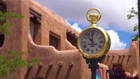 A-beautiful-shot-of-a-clock-near-Santa-Fe-New-Mexico-adobe-architecture