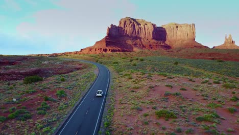 An-aerial-over-a-truck-traveling-on-a-road-through-Navajo-country-in-Arizona