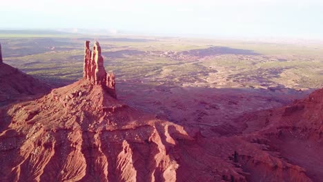 Beautiful-inspiring-aerial-at-sunset-over-rock-formations-in-Monument-Valley-Utah-2