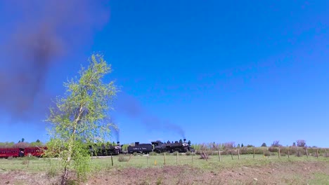 Traveling-shot-of-Cumbres-and-Toltec-steam-train-moving-through-Colorado-mountains-near-Chama-New-Mexico-3