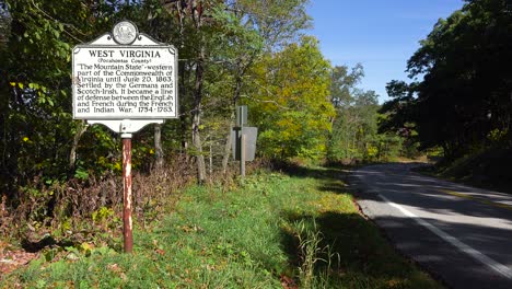 An-antique-historical-road-sign-welcomes-visitors-to-West-Virginia