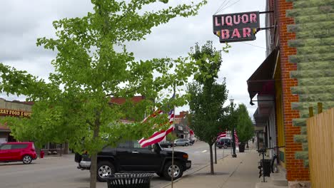 Establishing-shot-of-a-downtown-small-town-dive-bar-serving-liquor