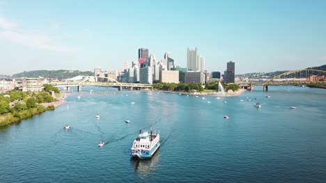 An-aerial-over-a-paddlewheel-tourist-boat-on-the-Monongahela-River-over-Pittsburgh-Pennsylvania