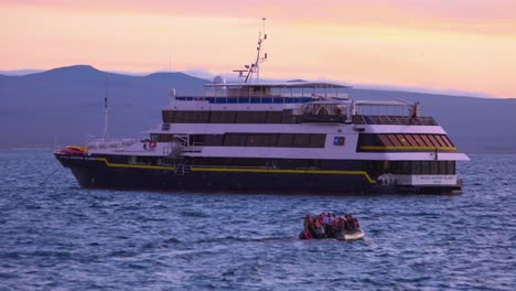 Tourists-return-to-a-research-boat-in-the-Galapagos-Islands