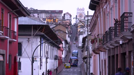 Busses-and-cars-travel-on-the-old-streets-of-Quito-Ecuador